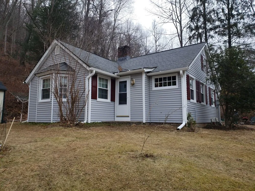 Slide of American Quality Roofing and Siding