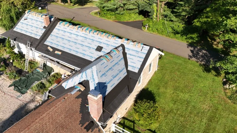 Slide of American Quality Roofing and Siding