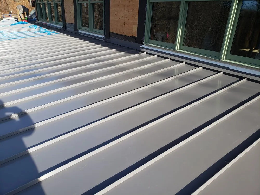 Slide of American Quality Roofing and Siding