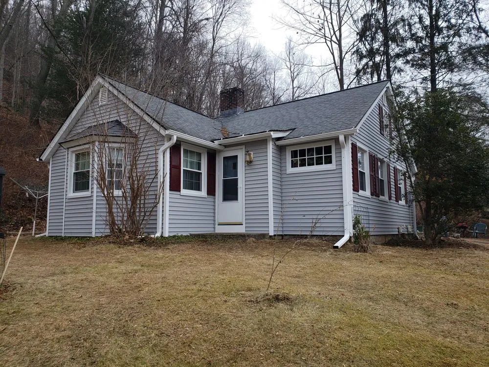 Slide of American Quality Roofing and Siding