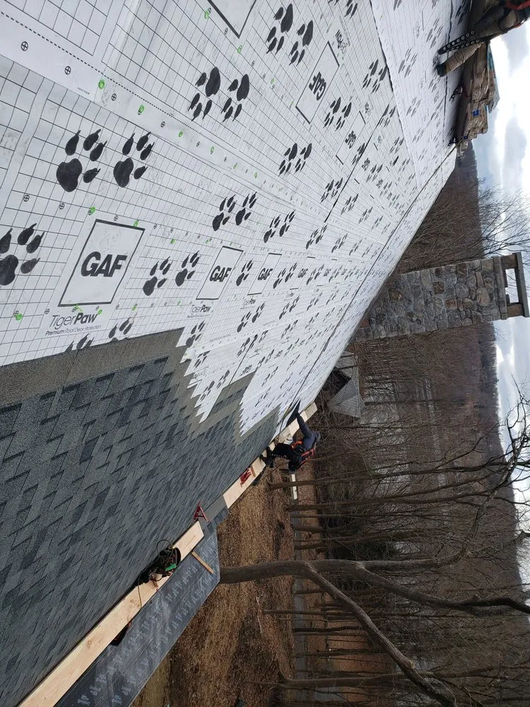 Slide of American Quality Roofing and Siding