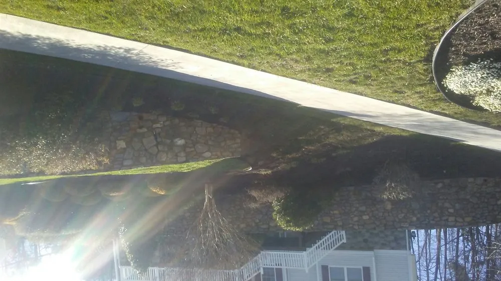 Slide of American Roofing and Landscaping