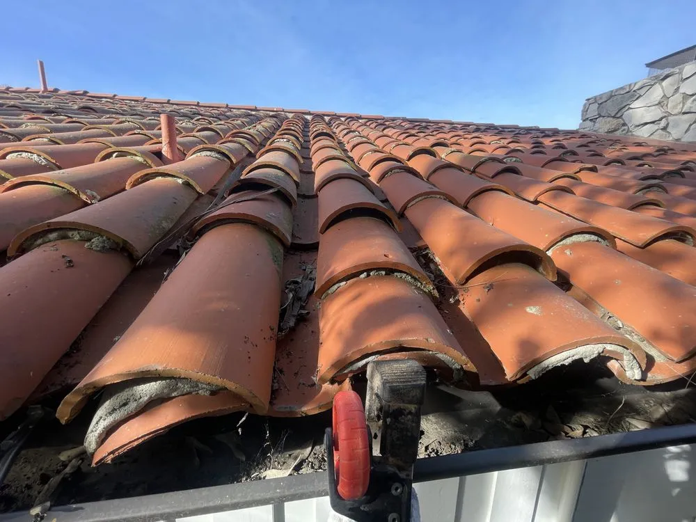 Slide of American Roofmasters Roof Repair