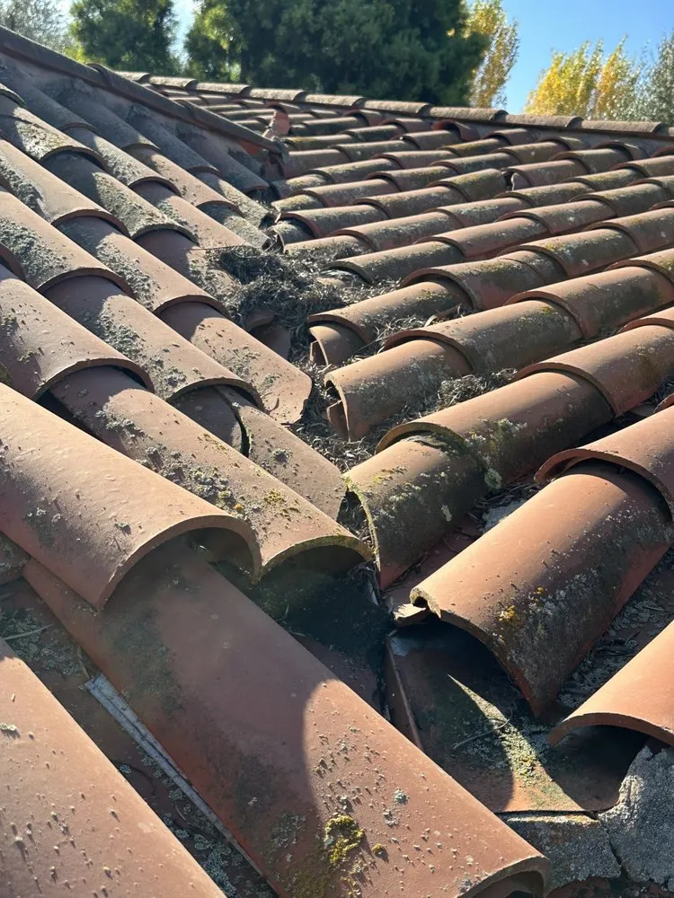 Slide of American Roofmasters Roof Repair