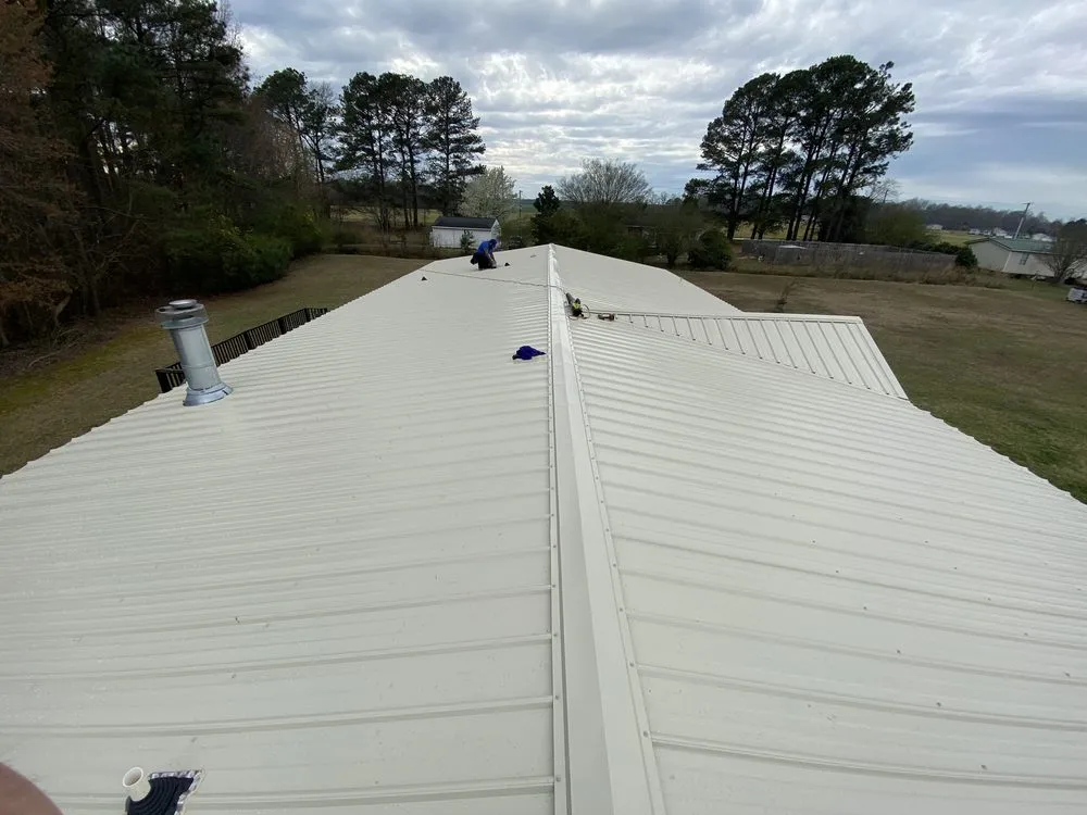 Slide of American Top Gun Roofing