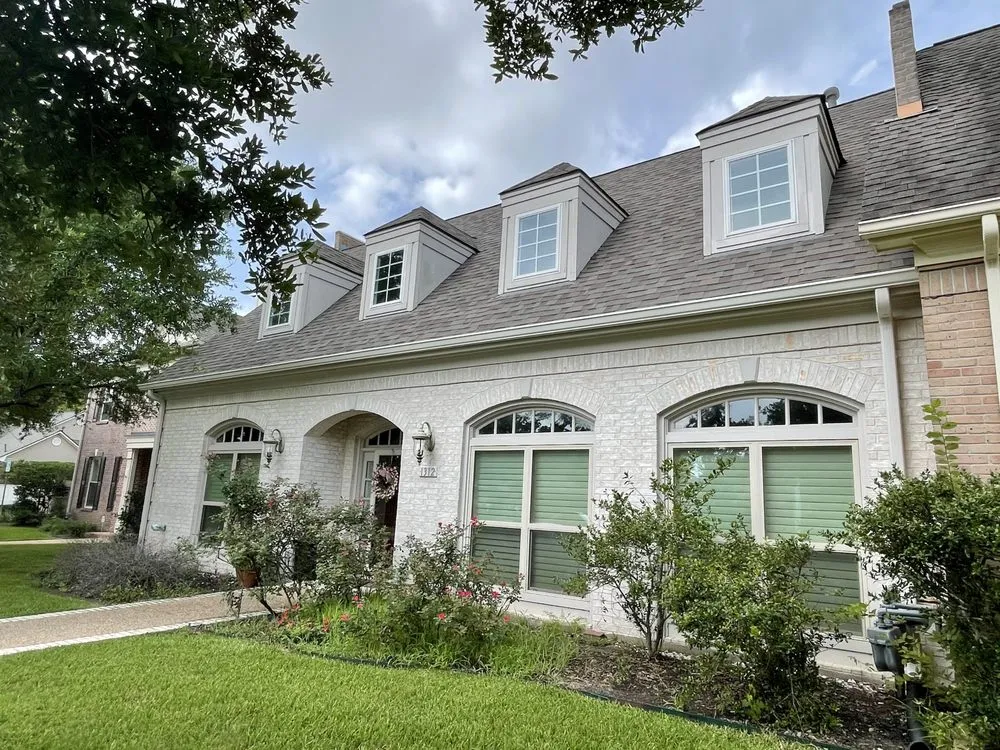 Slide of America's Choice Roofing