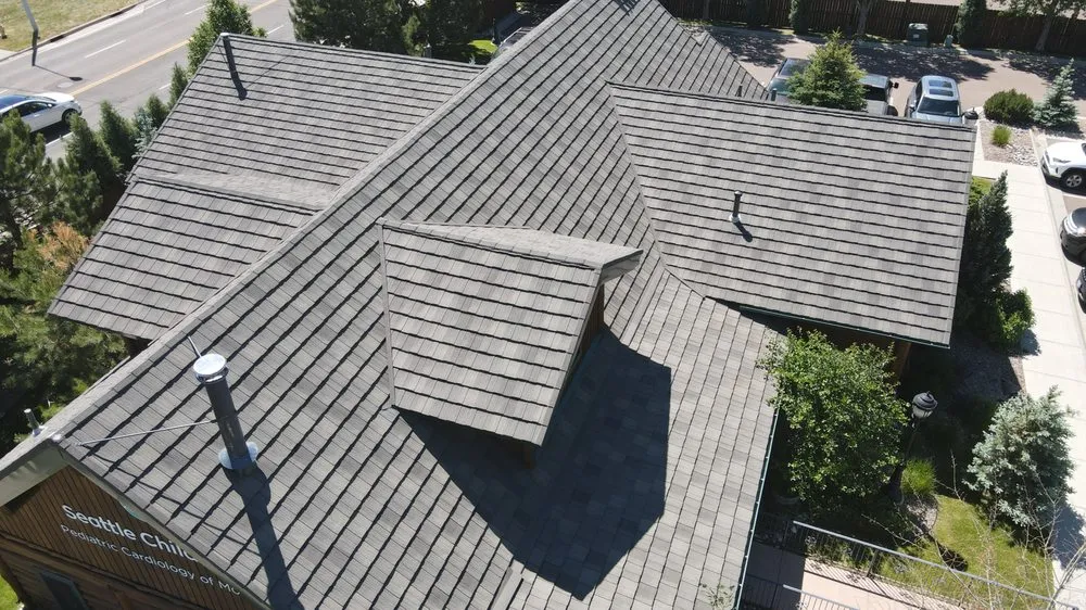 Slide of America's Choice Roofing