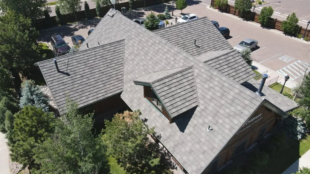 Slide of America's Choice Roofing