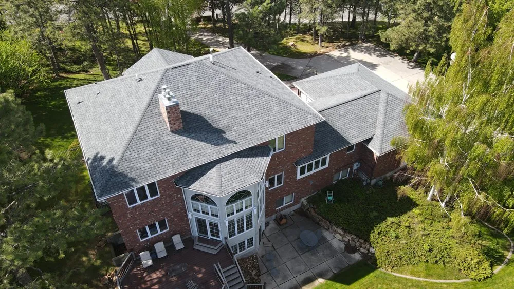 Slide of America’s Choice Roofing