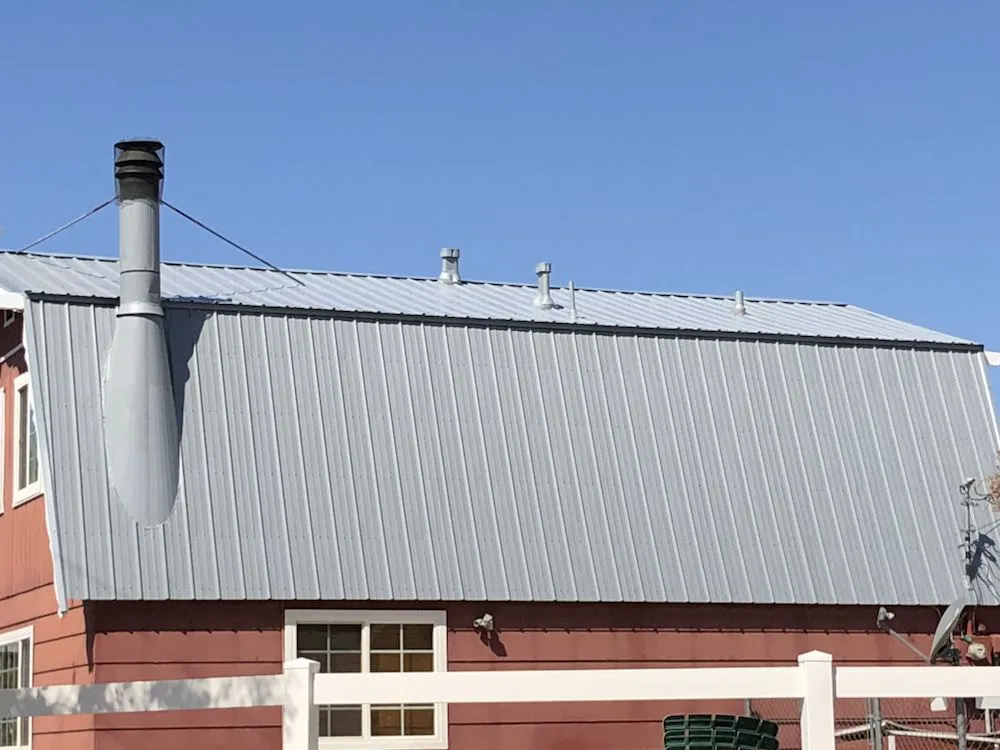 Slide of AMG Roofing