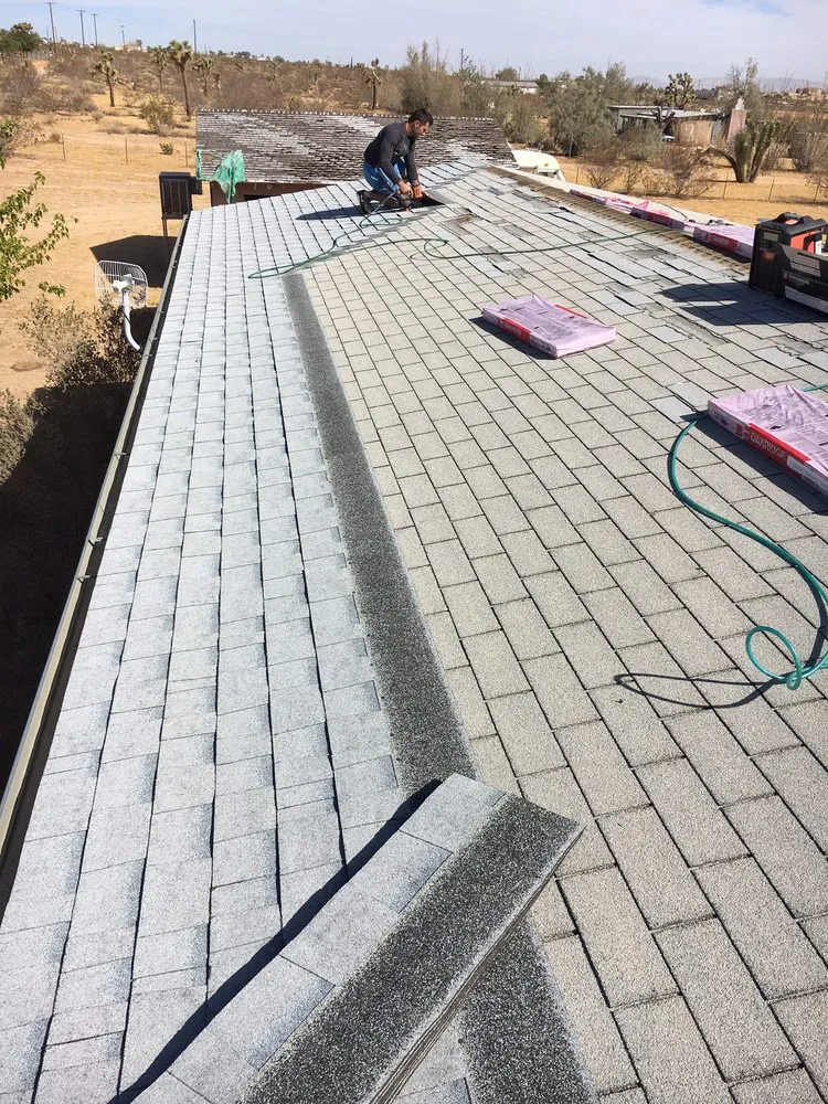 Slide of AMG Roofing