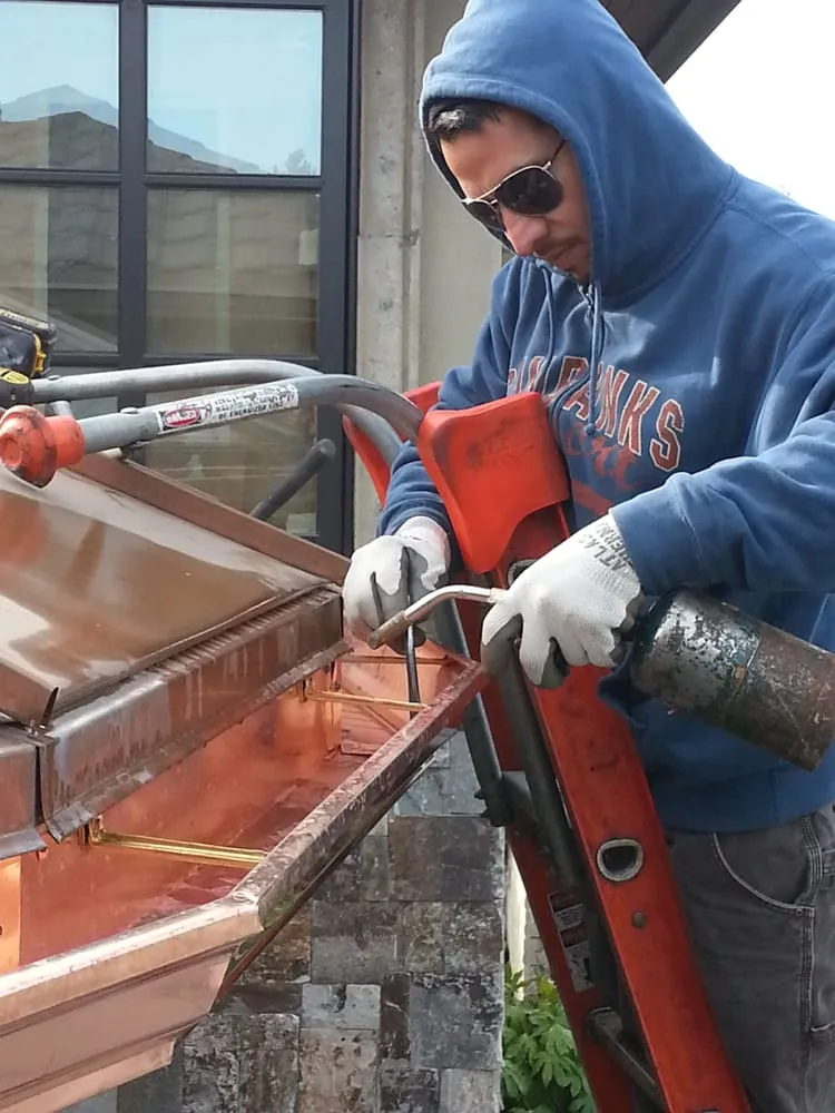 Slide of Amigo Gutters