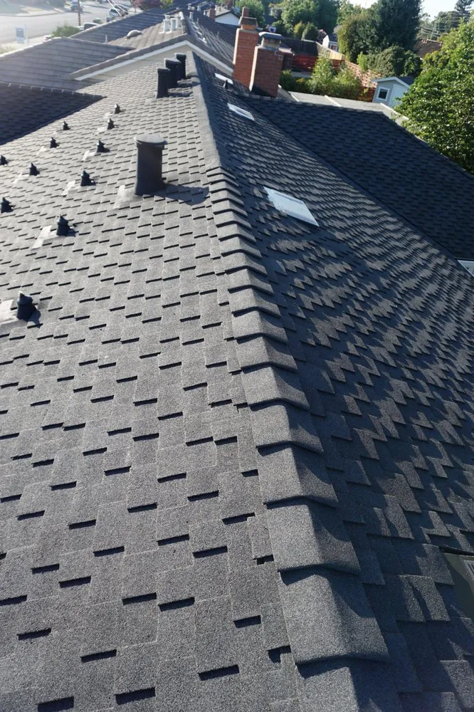 Slide of AMK Roofing