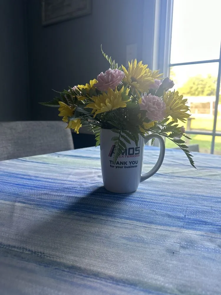 Slide of Amos Roofing & Exteriors