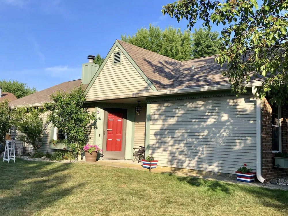 Slide of Amos Roofing & Exteriors