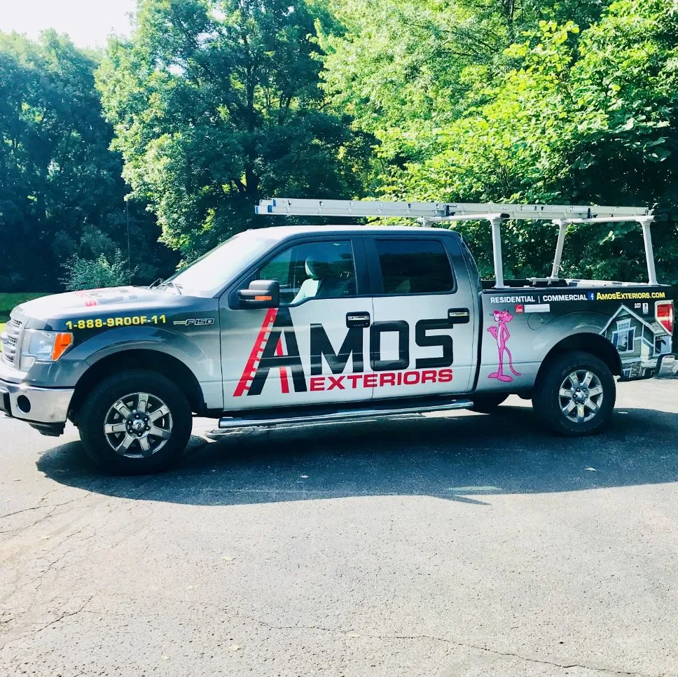 Slide of Amos Roofing & Exteriors
