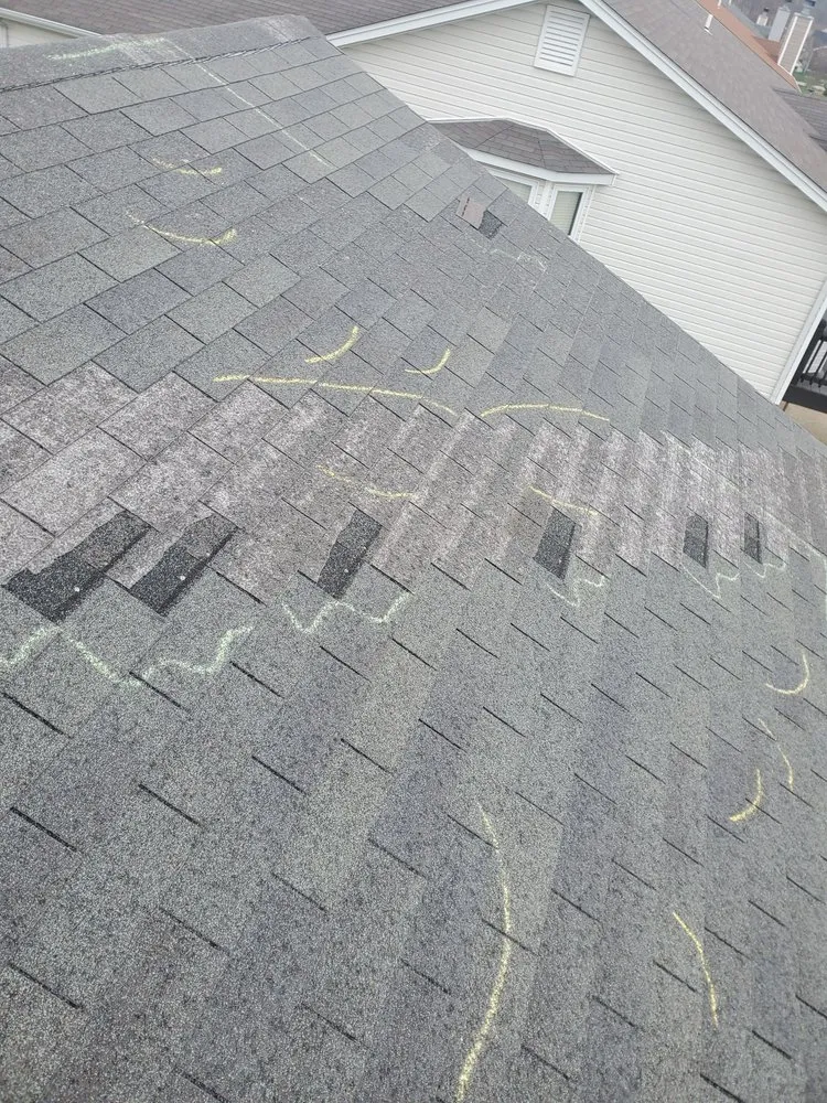 Slide of AMP Restoration & Roofing