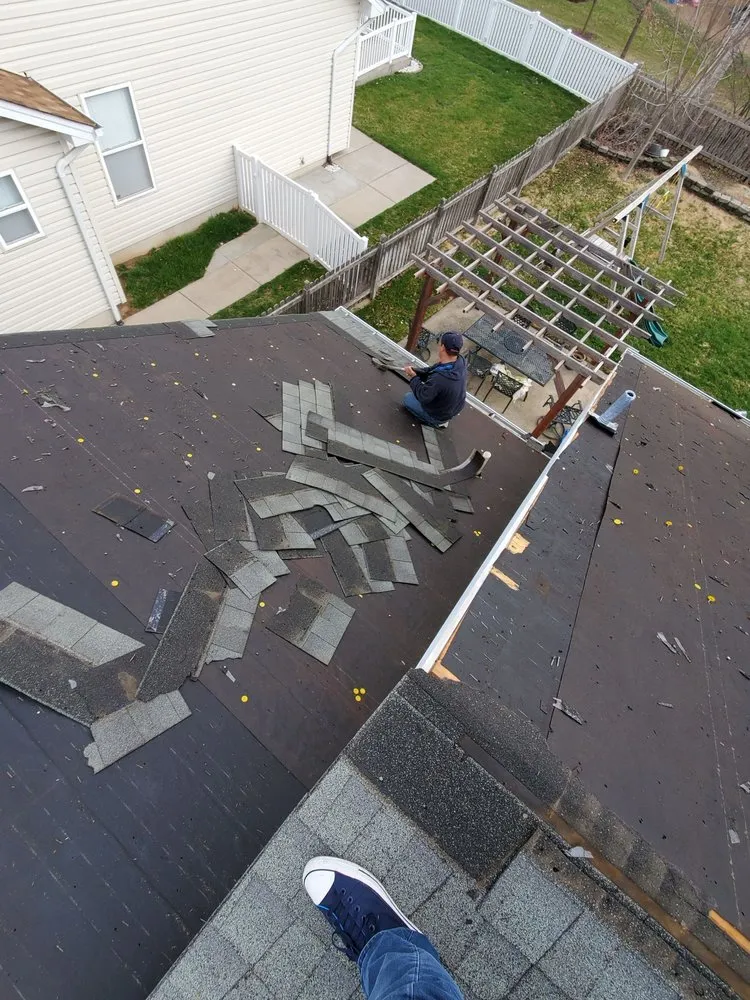 Slide of AMP Restoration & Roofing