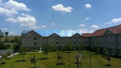 Slide of AMP Restoration & Roofing