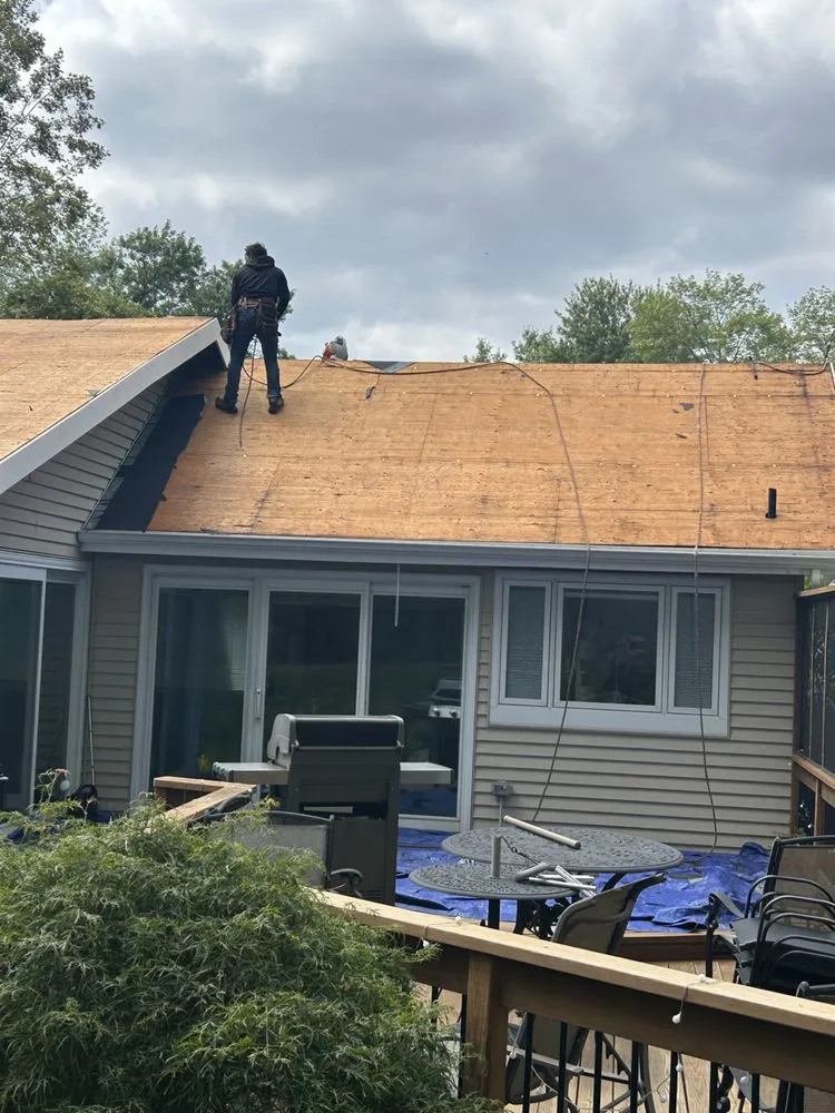 Slide of AMP Restoration & Roofing
