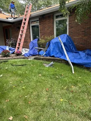 AMP Restoration & Roofing Logo