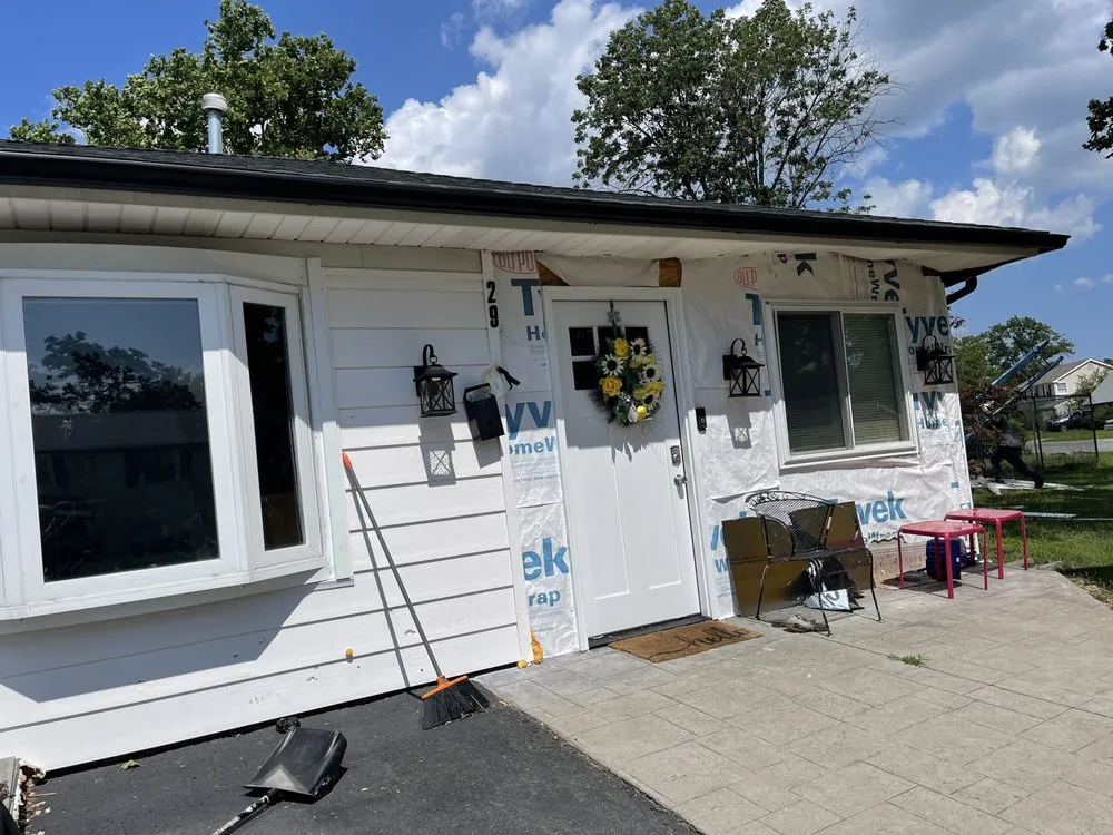 Slide of Amsterdam roofing experts