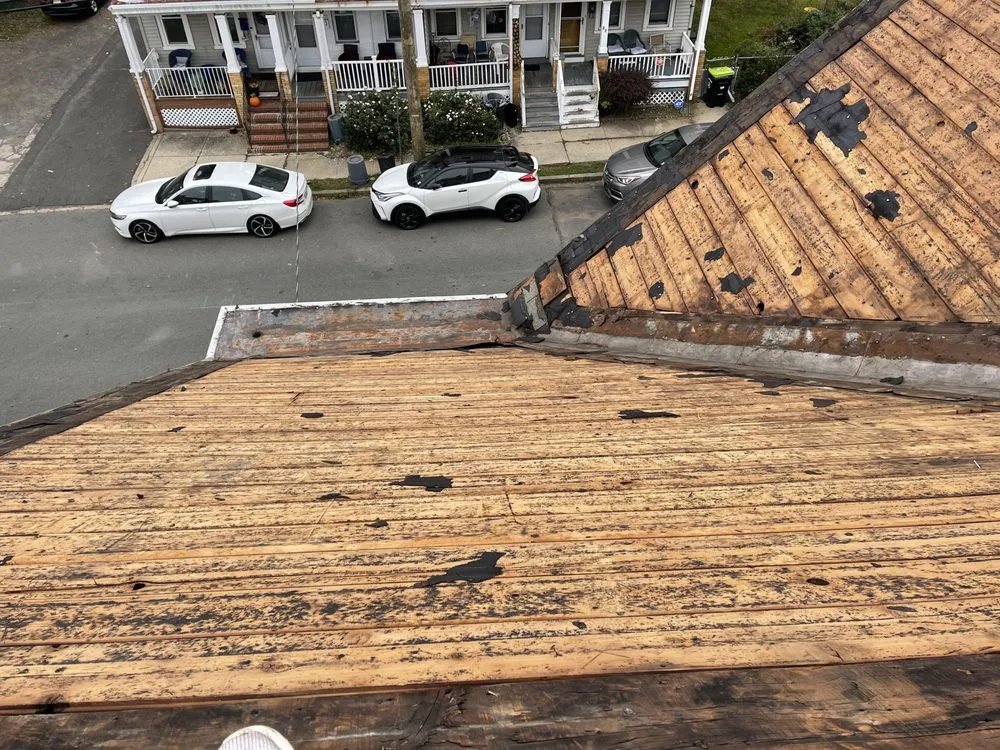 Slide of Amsterdam roofing experts