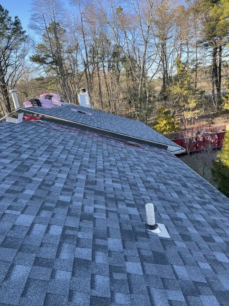 Slide of Amsterdam roofing experts