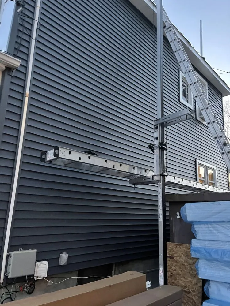 Slide of Amsterdam roofing experts