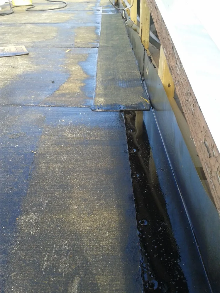 Slide of Anchor Roofing Services