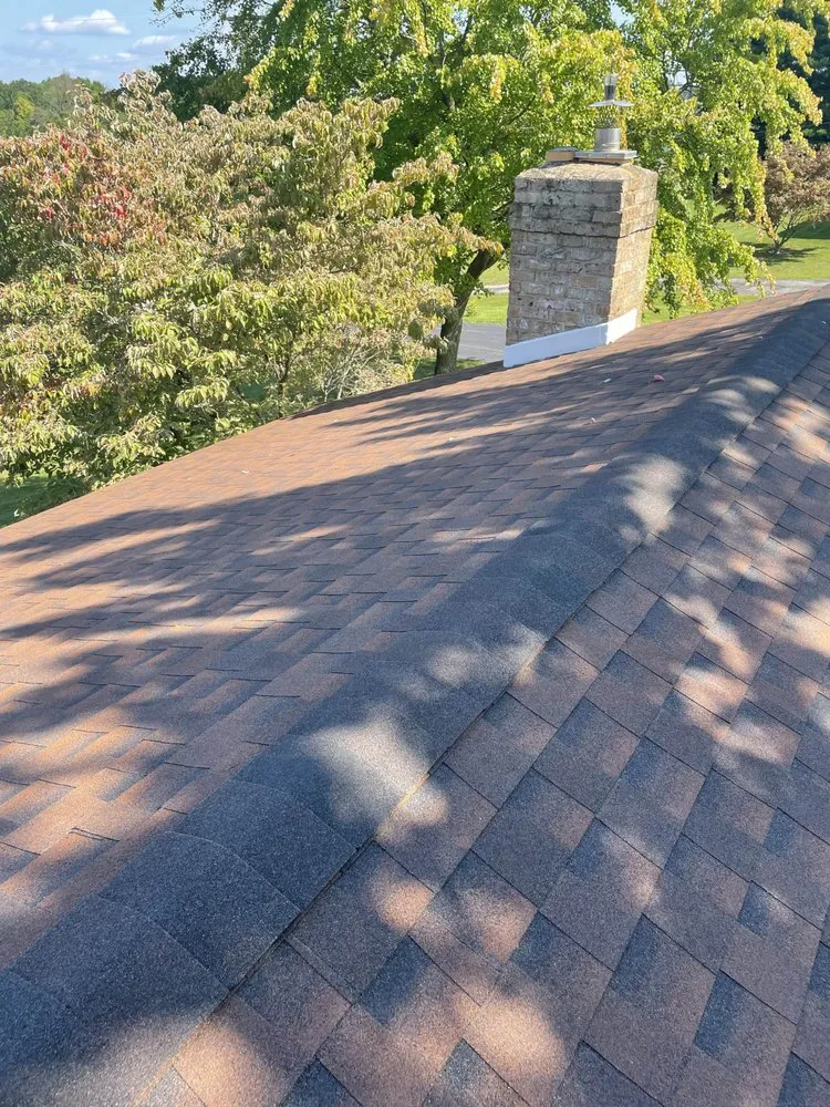 Slide of Ancxus Roofing Solutions