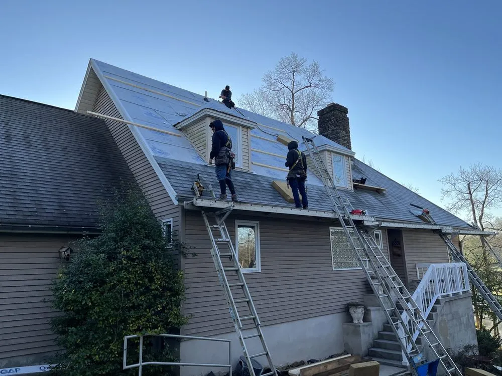 Slide of Ancxus Roofing Solutions