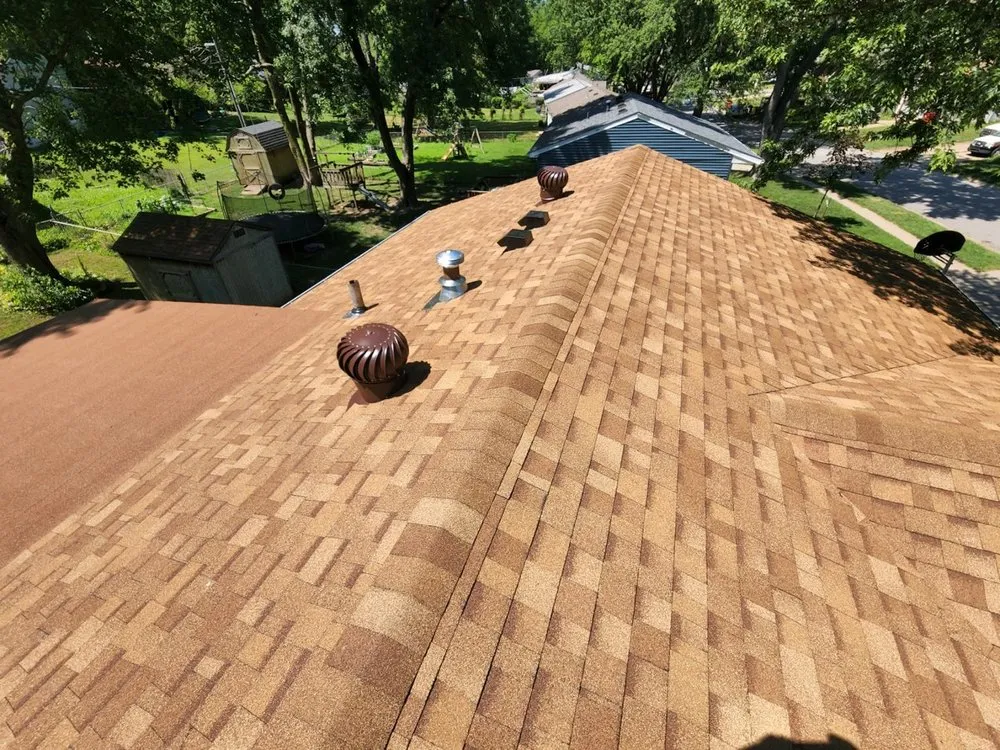 Professional roof inspection in Lee's Summit, MO by Andersen Roofing and Contracting