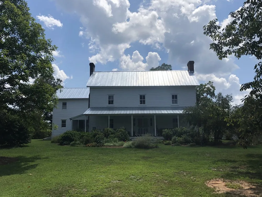 Slide of Anderson Metal Roofing and Shingles