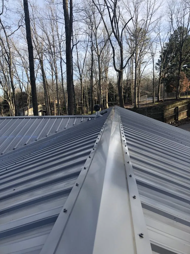 Slide of Anderson Metal Roofing and Shingles