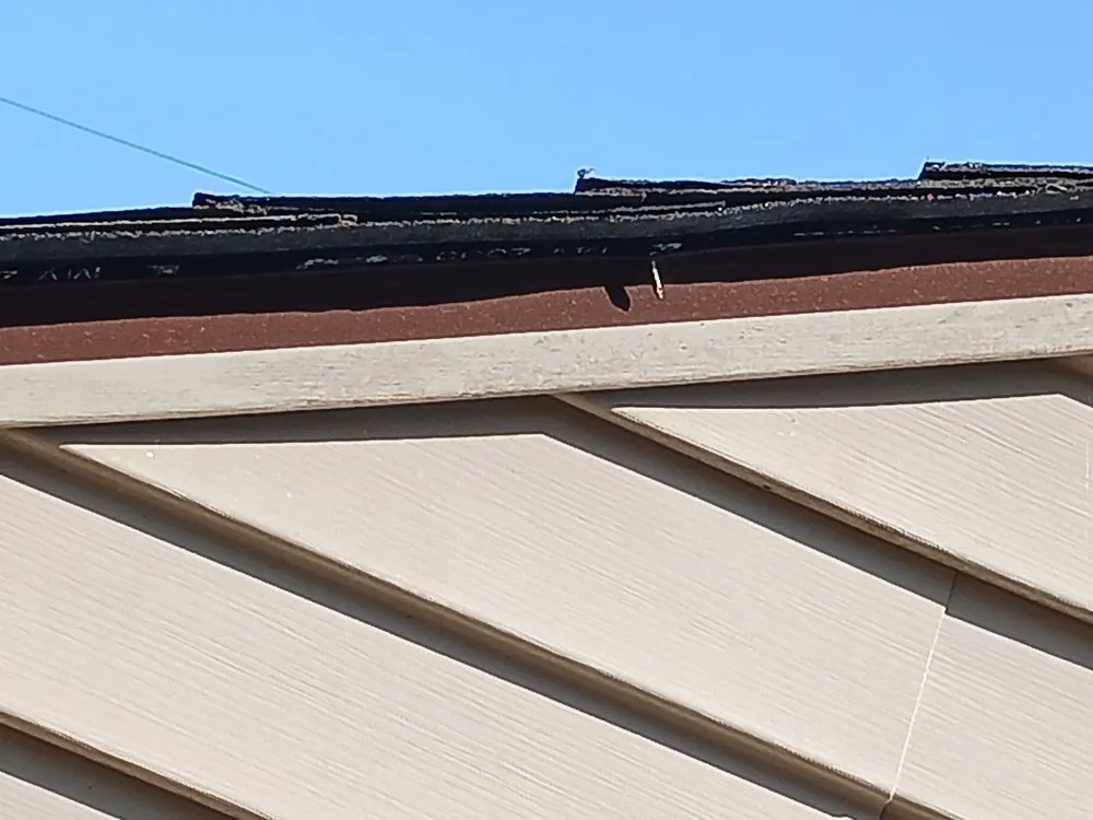 Slide of Andes Roofing