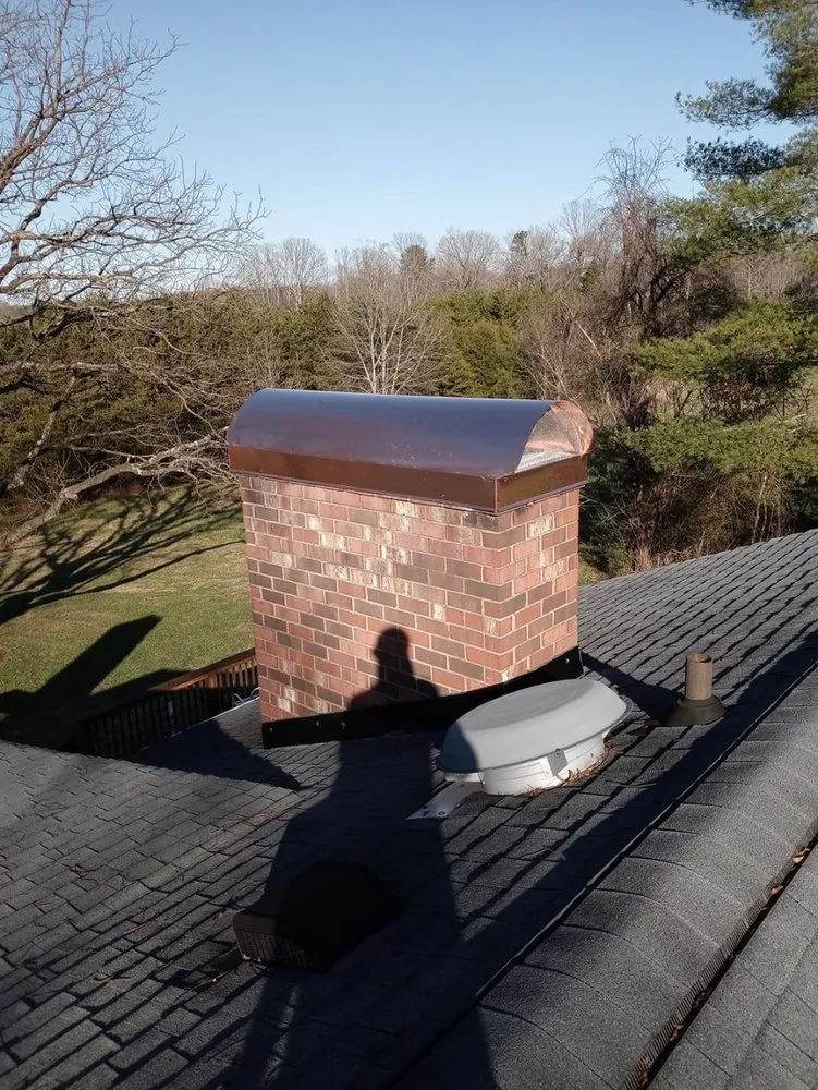 Professional roof leak repair after storm damage in Pfafftown, NC by Andrew’s Chimney Caps