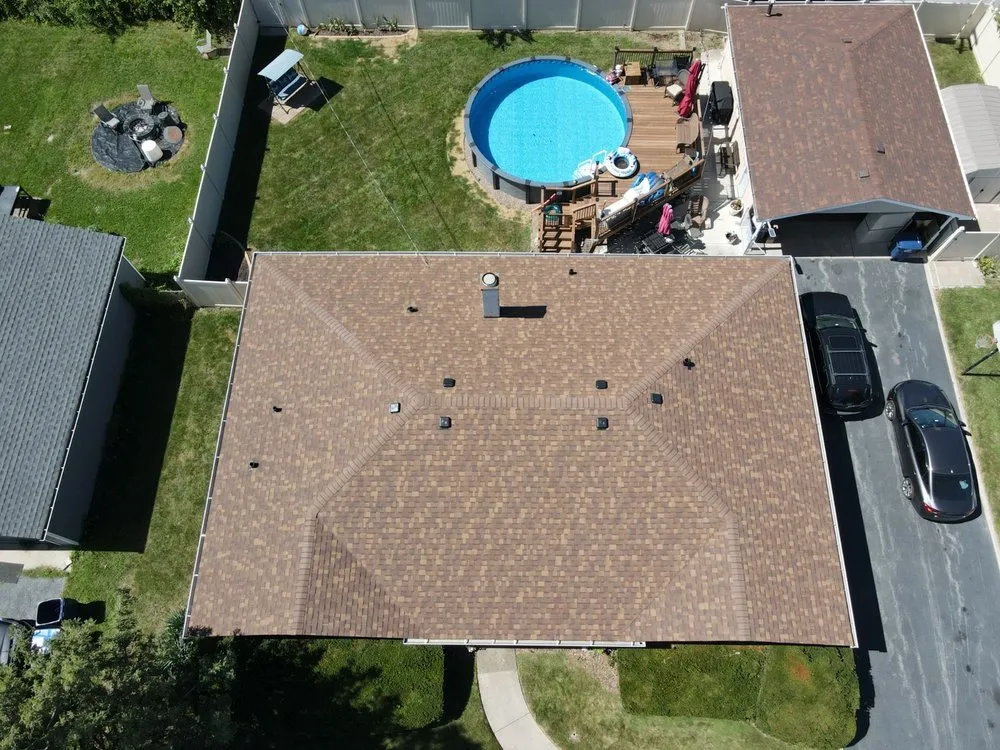 Slide of Andrew's Roof & Gutter Maintenance