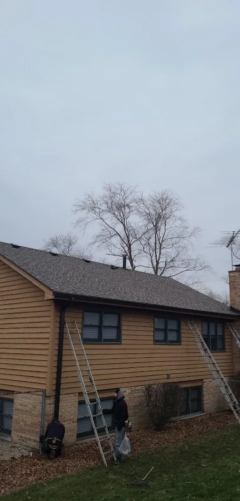 Slide of Andrew's Roof & Gutter Maintenance