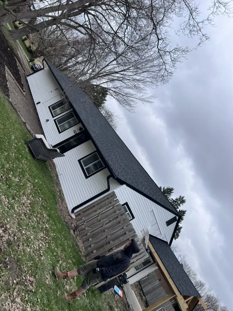 Slide of Andrews Roofing & Construction