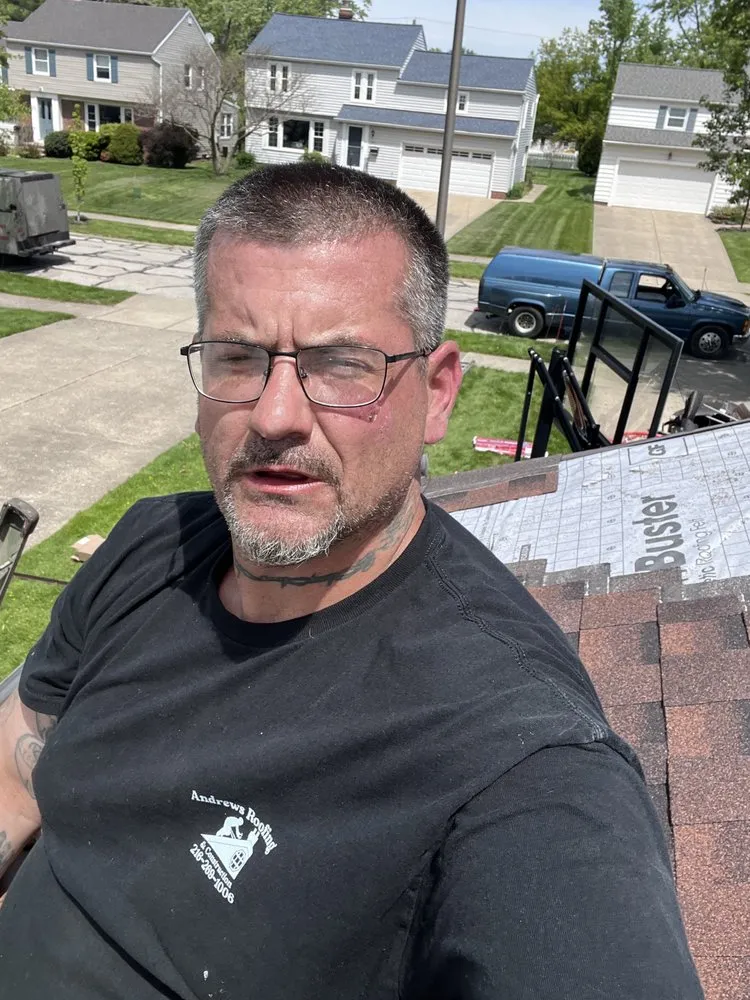 Slide of Andrews Roofing & Construction