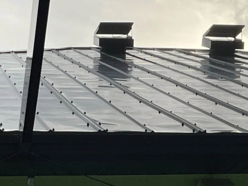 Slide of Andrews Roofing