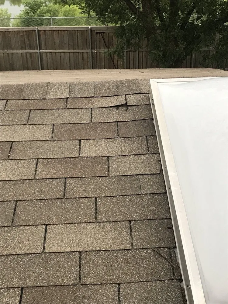 Slide of Andrus Brothers Roofing