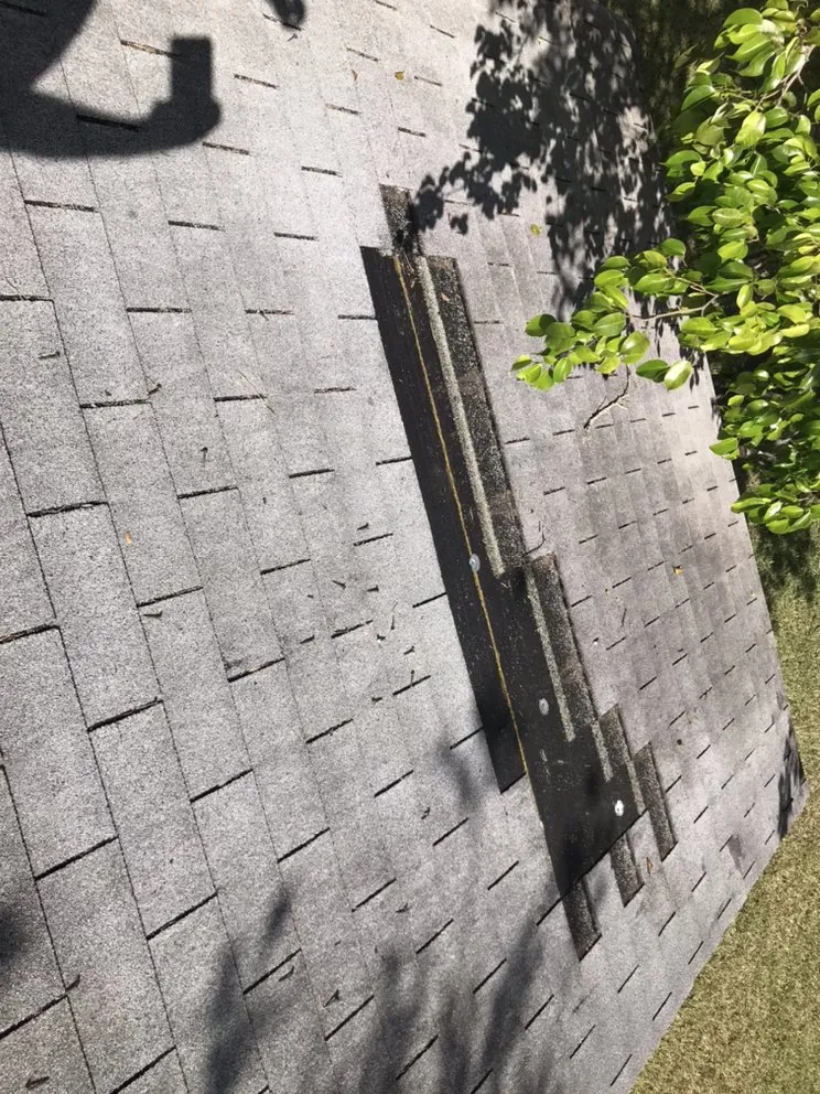 Slide of Andy The Roofer & Co