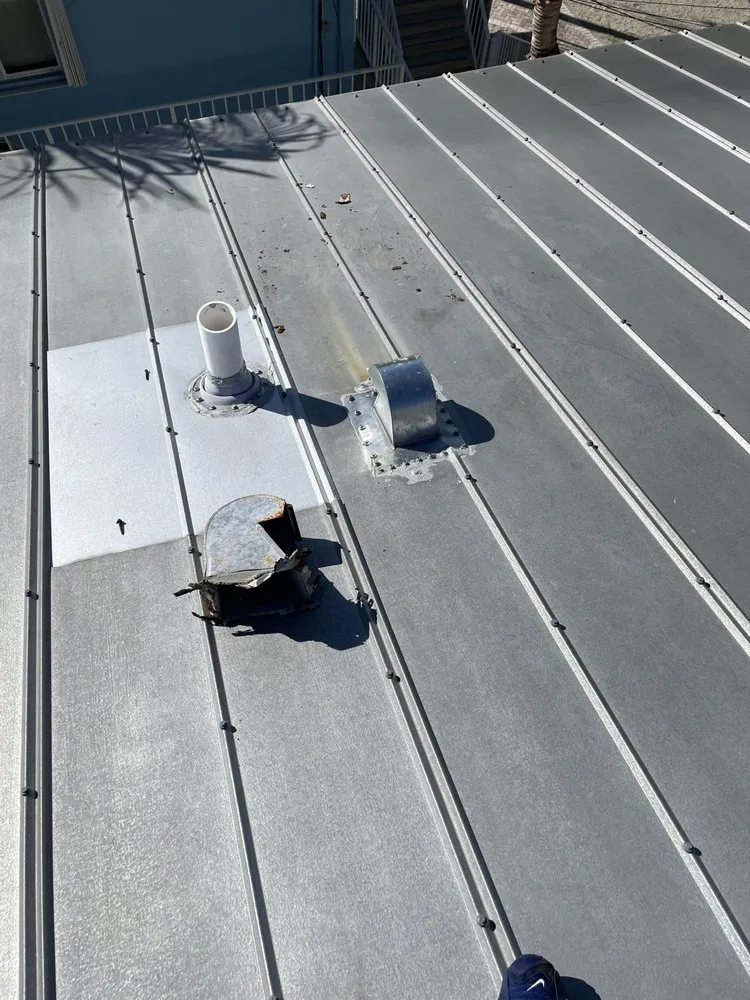 Slide of Andy The Roofer & Co