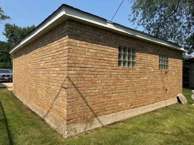 Slide of Andy's Custom Gutters