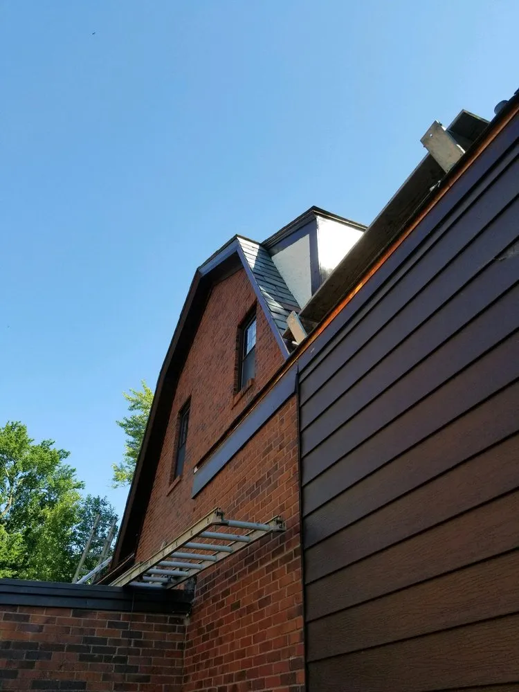 Slide of Andy's Roofing Company