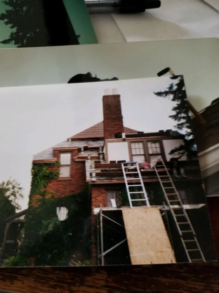 Slide of Andy's Roofing Company