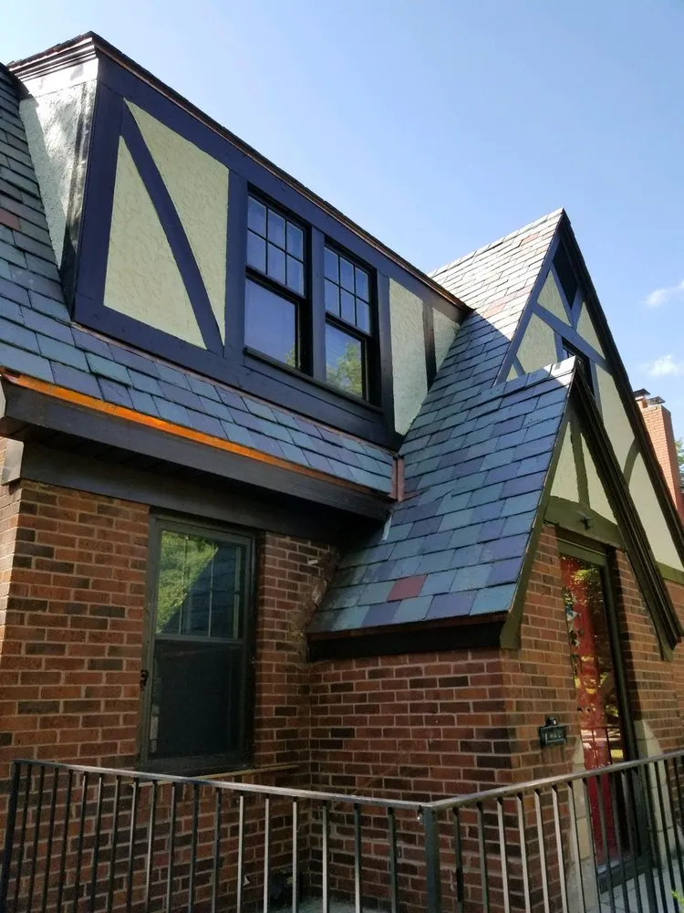 Slide of Andy's Roofing Company