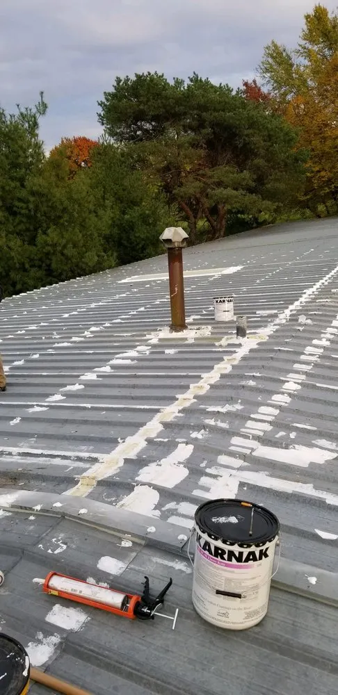 Slide of Andy's Roofing Company